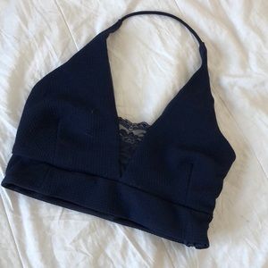 Risqué navy blue halter with a lace camisole